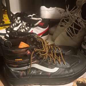 Vans Black Camo High-Top Boots with Orange Accents